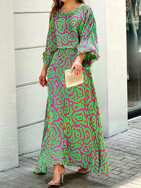 Loose printed long-sleeved top and high waist skirt two-piece set