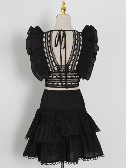 Hollow top + high-waisted cake splicing skirt two-piece set