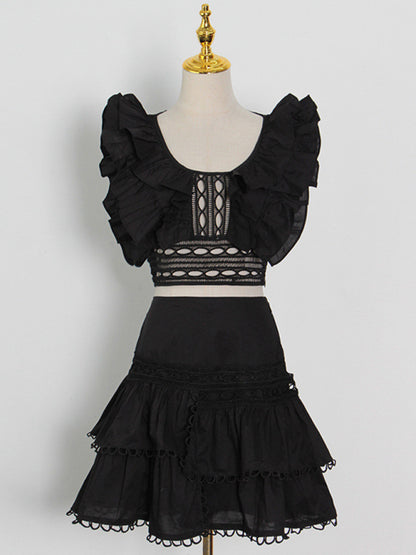 Hollow top + high-waisted cake splicing skirt two-piece set