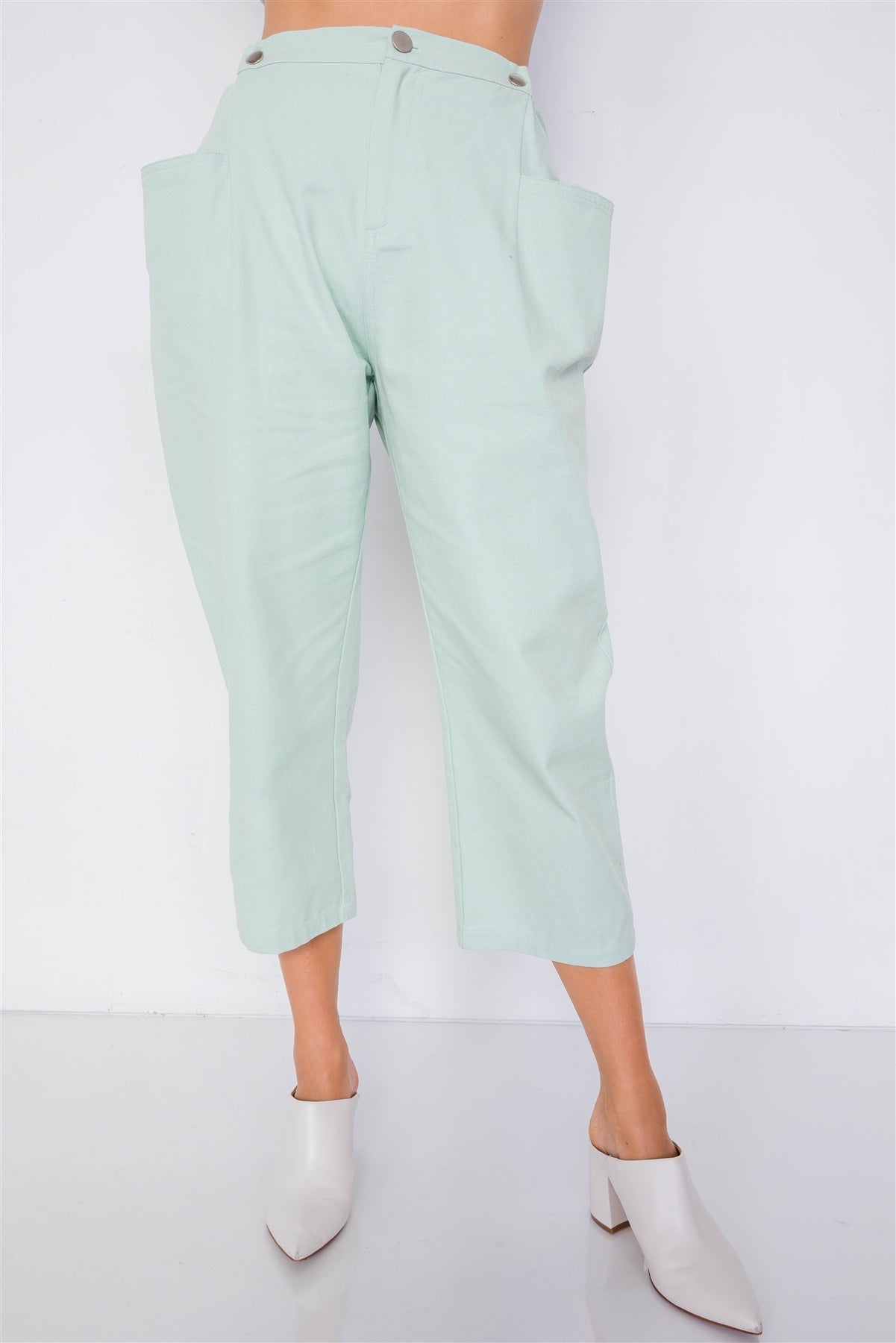 Pantalones de cintura con broche ajustable y pierna ancha con tobillo liso y elegante en colores pastel