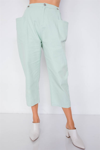 Pantalones de cintura con broche ajustable y pierna ancha con tobillo liso y elegante en colores pastel